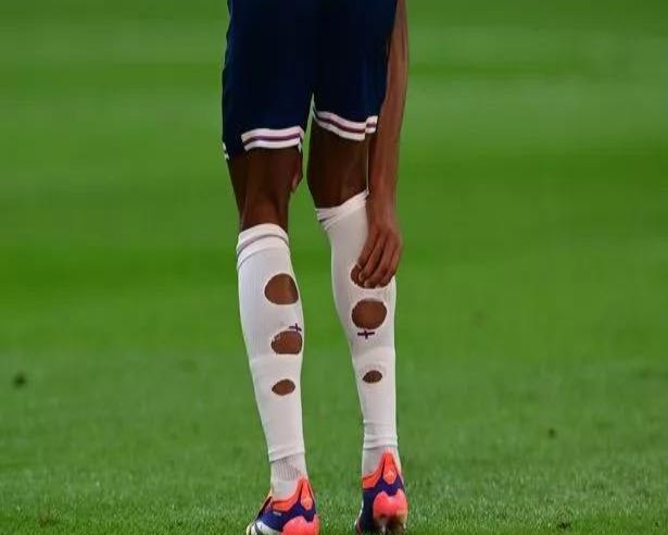 TRENDING: Why Are Athletes Cutting Holes in Their Socks?